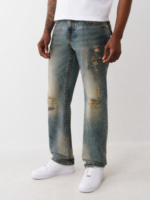 True Religion Jeans Ricky Big T Flap 34In Warm Sand Med Wash With Rips
