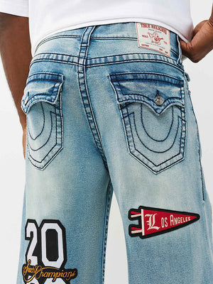 TRUE RELIGION JEANS PATCH VINNY BIG T FLAP 34IN SHATTERED MEDIUM INDIGO WASH